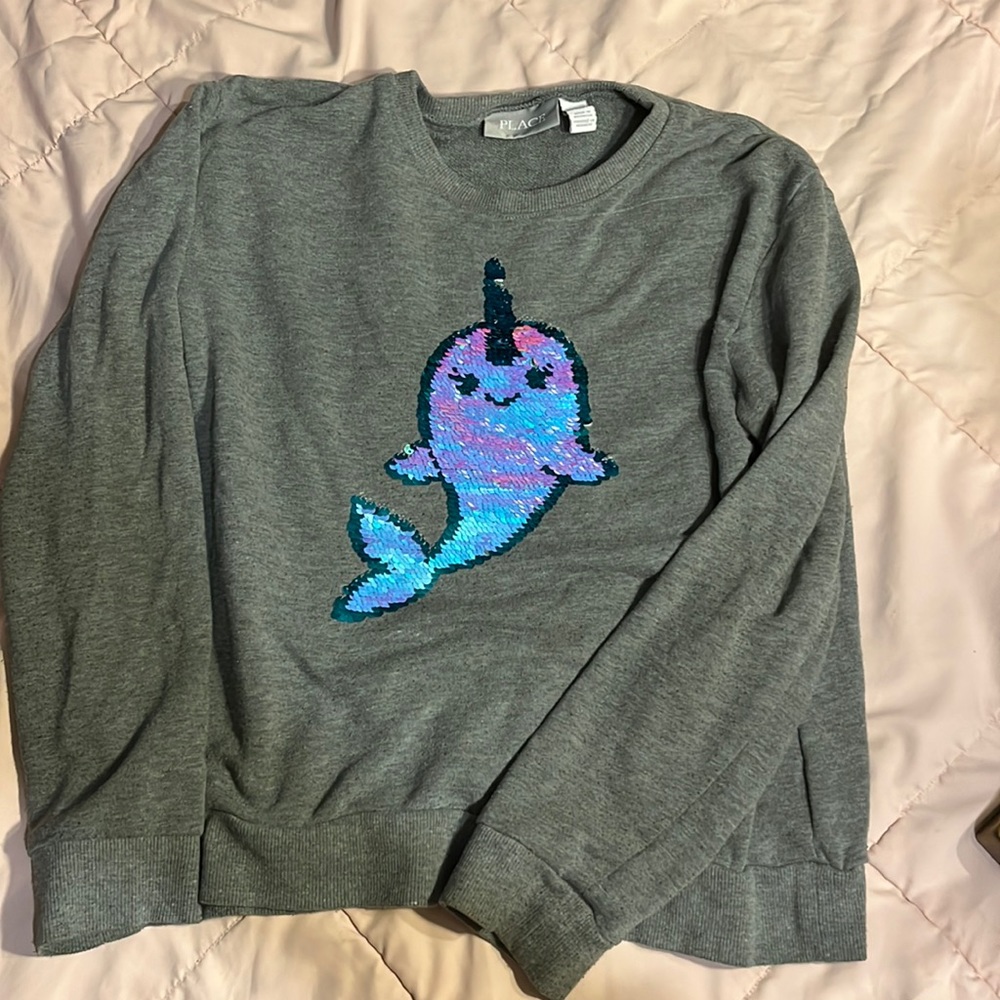 Gray sweater with the Norwhal sequins moves to change color of narwhals